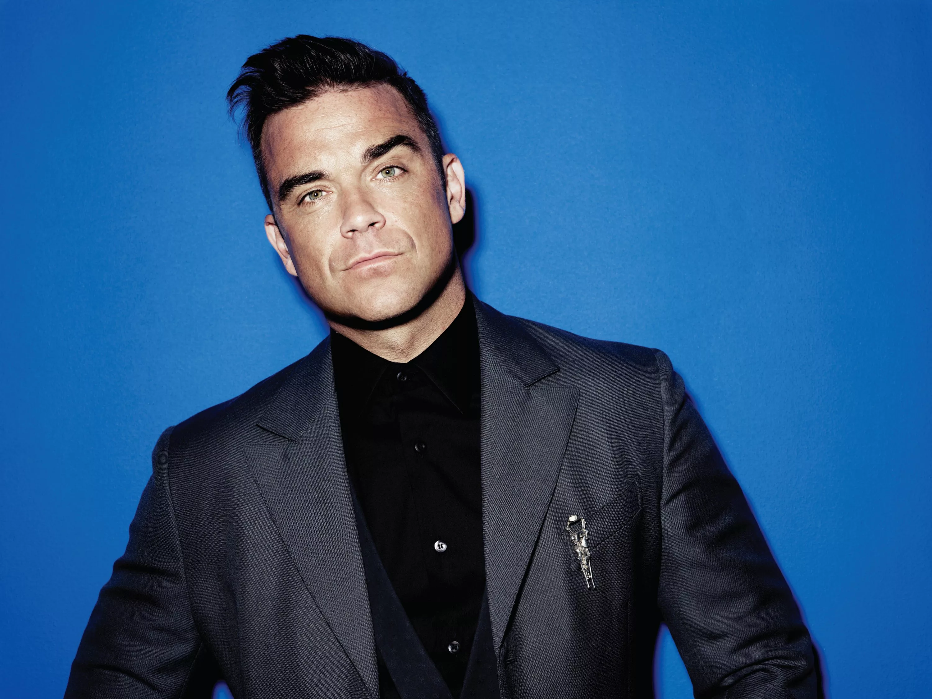Hør Robbie Williams' nye single – og uddrag fra albummet