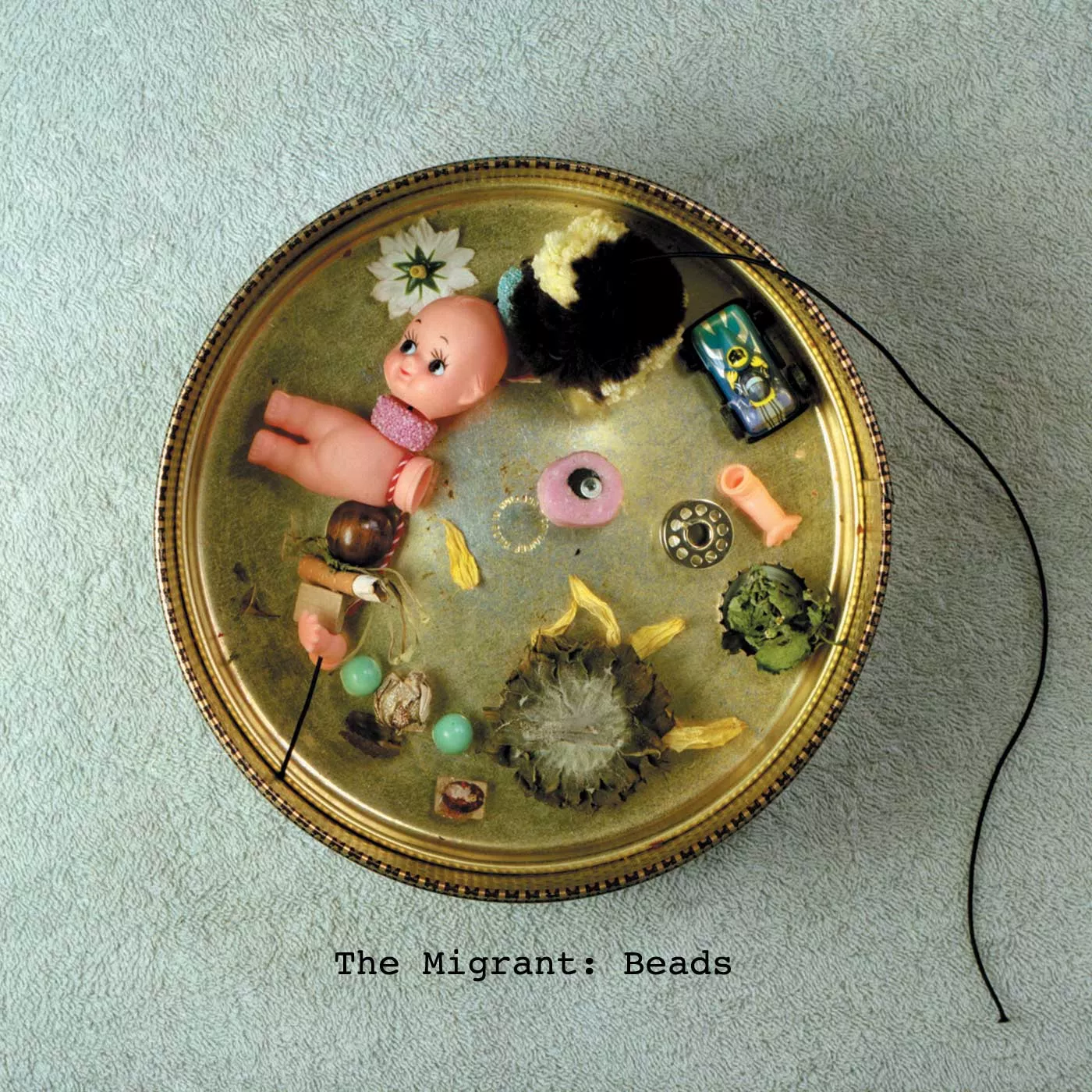 Beads - The Migrant